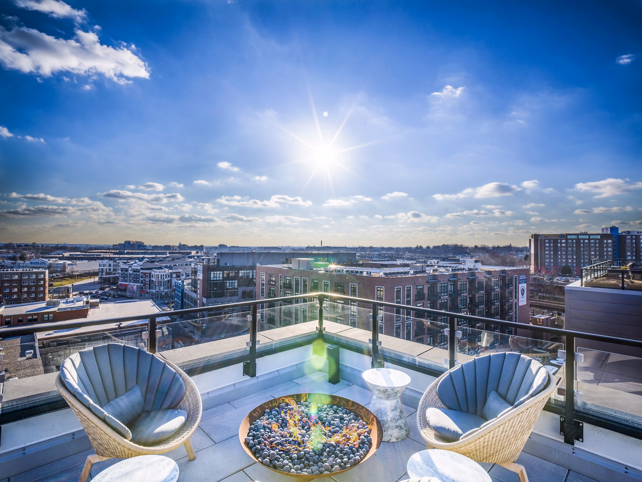 Modern outdoor fire pit on spacious patio at Rowan Apartments