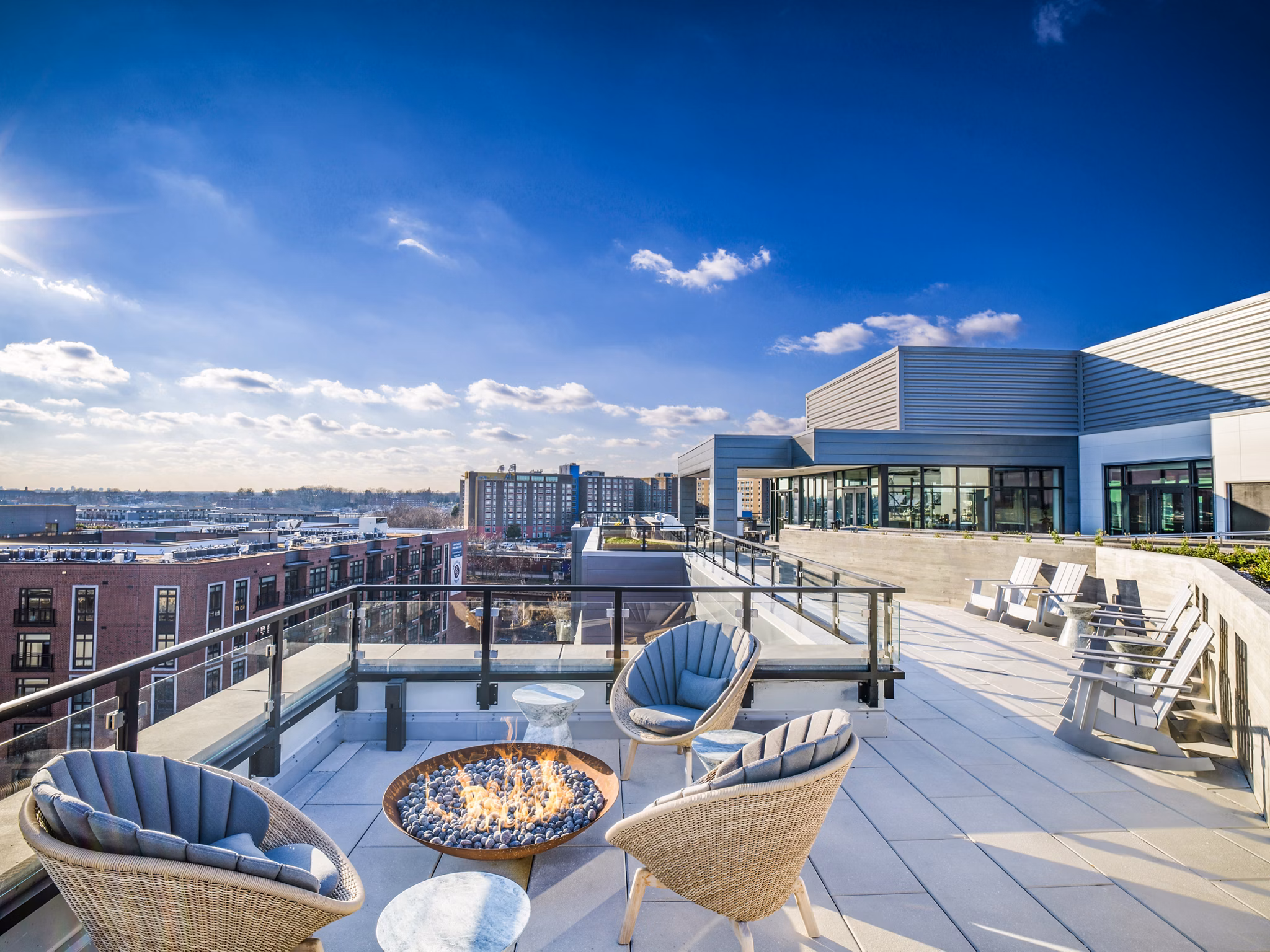 Spacious patio with modern furnishings at Rowan Apartments, offering luxury outdoor living experiences
