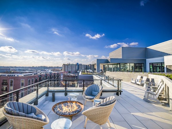 Spacious patio with modern furnishings at Rowan Apartments, offering luxury outdoor living experiences