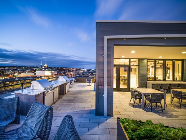 Grill area with modern amenities at Rowan Apartments in Charlotte, perfect for outdoor gatherings and cookouts