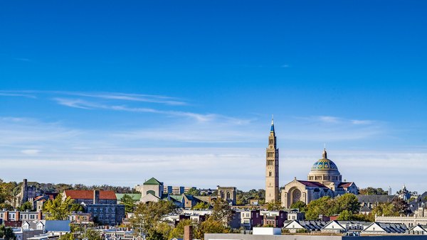 Scenic city view from a balcony at Rowan Apartments, luxury living in urban elegance