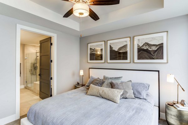 Cozy bedroom with modern decor at The Bower Apartments