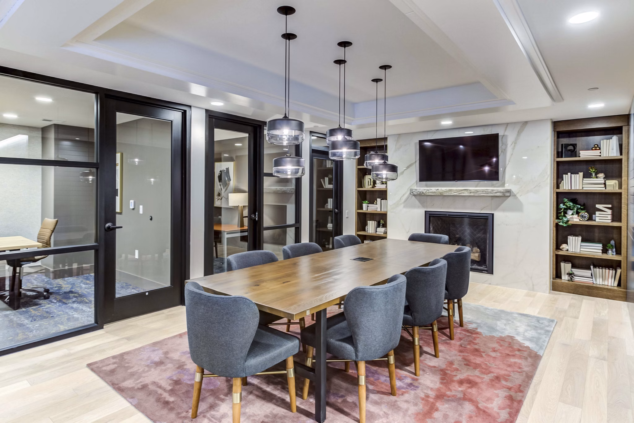 Game room featuring pool tables and arcade games at The Bower Apartments