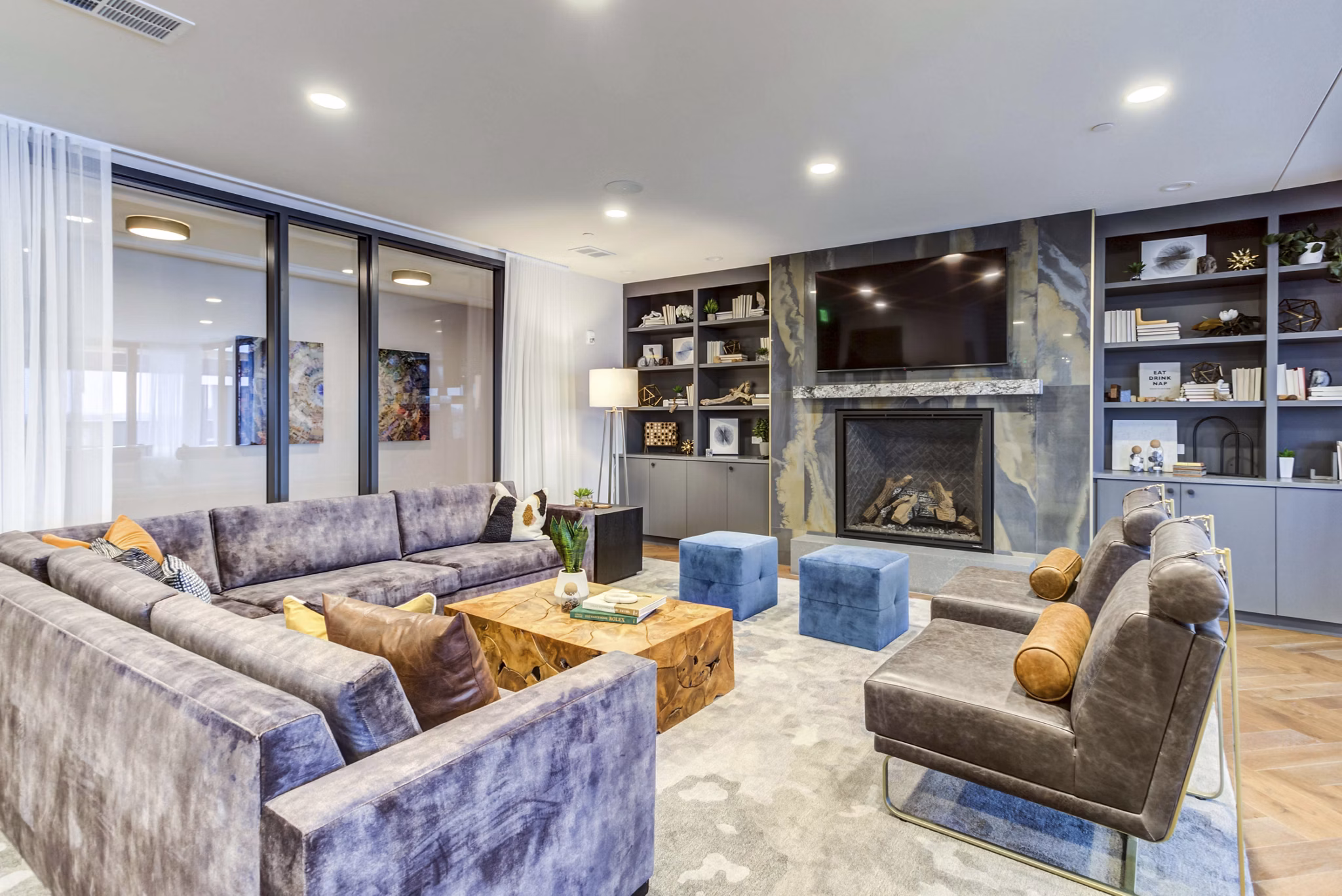 Clubhouse featuring modern seating and entertainment options at The Bower Apartments