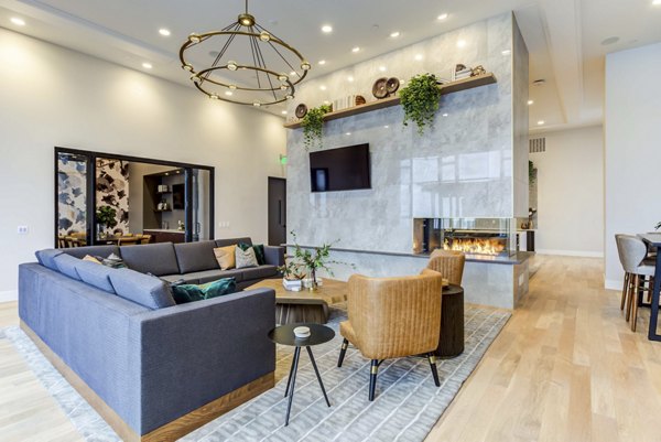 Clubhouse featuring spacious lounge and modern decor at The Bower Apartments