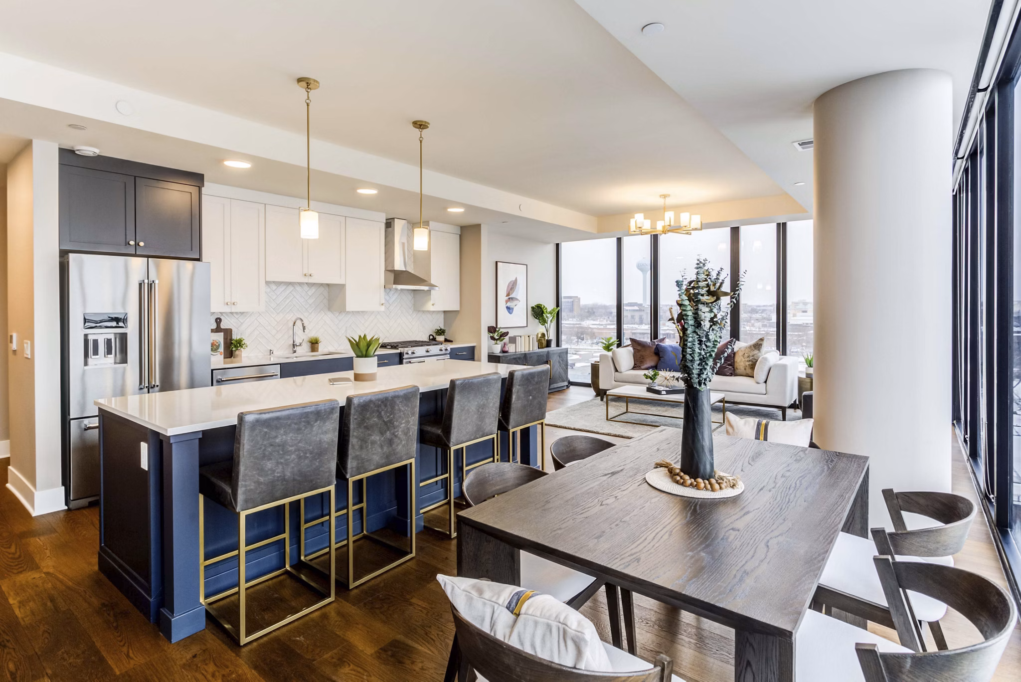 Elegant dining area with modern lighting at The Bower Apartments, perfect for hosting guests in a luxurious setting