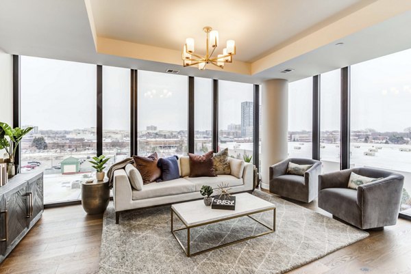 Spacious living room with modern decor in The Bower Apartments