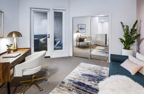 Cozy upstairs office/bedroom with natural light at Alexan Gallerie Apartments