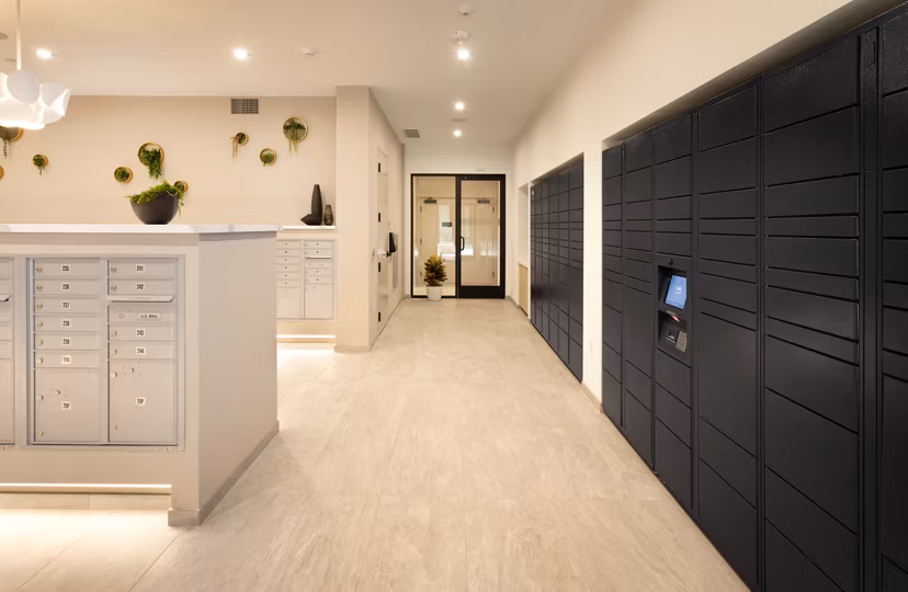 Conveniently designed mail room at Alexan Gallerie Apartments for efficient package management and resident accessibility