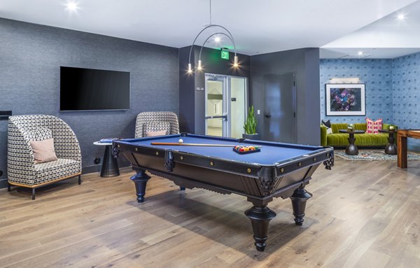 Modern game room with billiards and entertainment space at Alexan Gallerie Apartments
