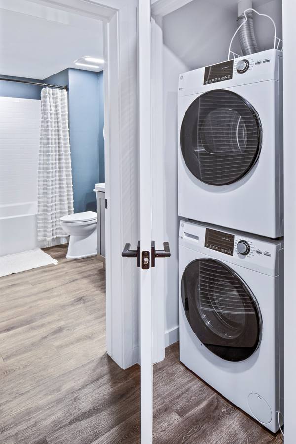 laundry room at Alexan Gallerie Apartments