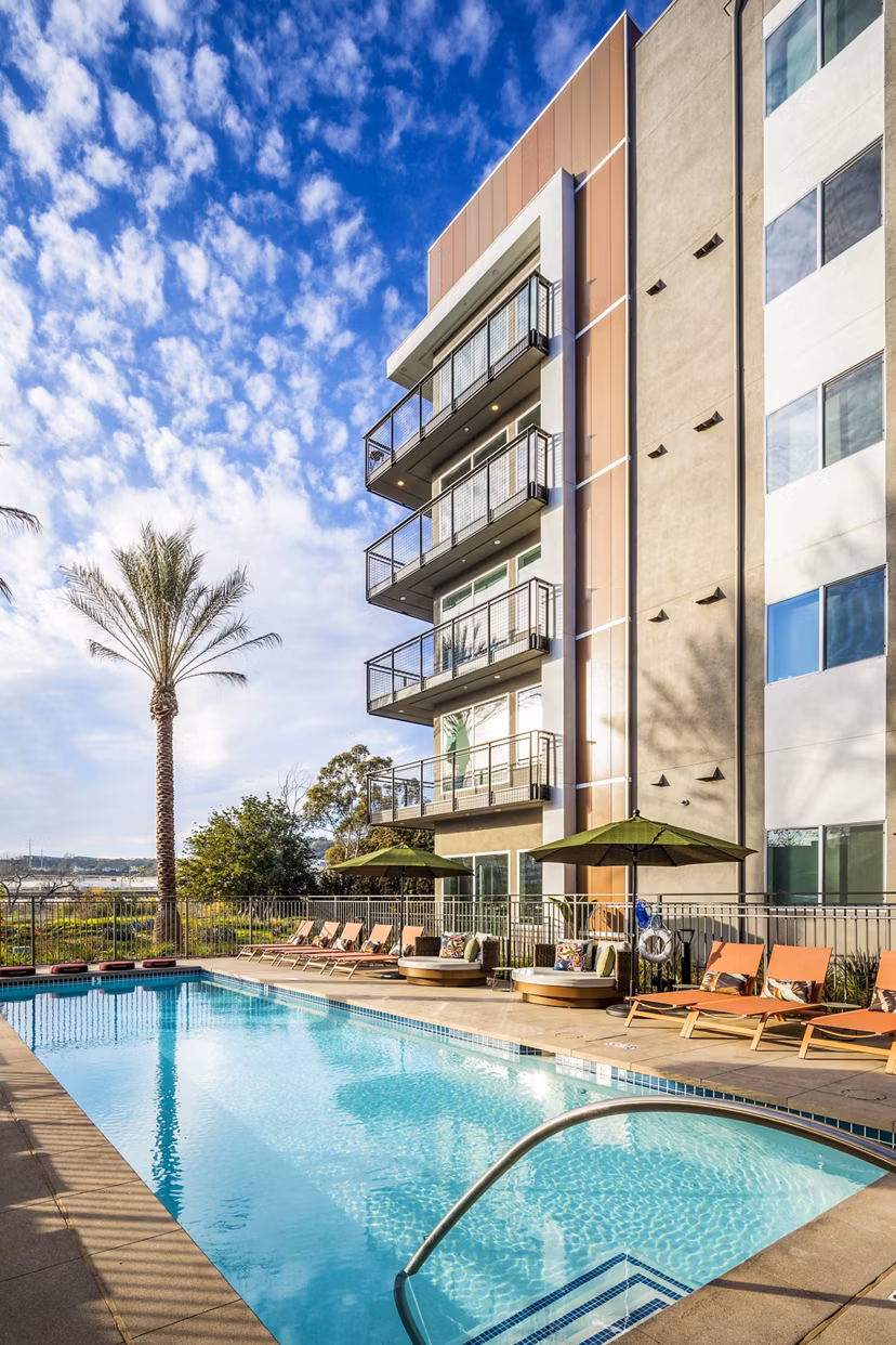 Luxurious outdoor pool at Alexan Gallerie Apartments offering resort-style relaxation and modern amenities