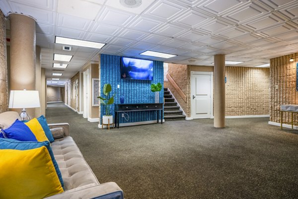 Clubhouse featuring modern design and entertainment space at Glo Apartments, a luxury Greystar property in Los Angeles