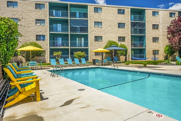Rooftop pool with city views at Glo Apartments, a luxury Greystar community