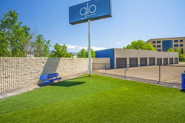 Dog park featuring agility equipment at Glo Apartments: Pet-friendly outdoor space for residents to enjoy with their dogs