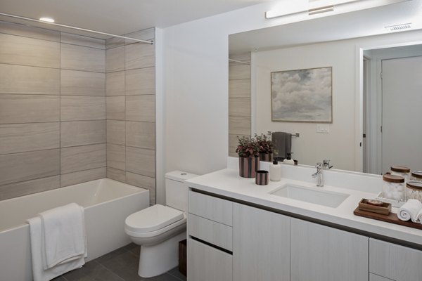 Modern bathroom with sleek design at VOX Apartments: luxury living spaces with premium features