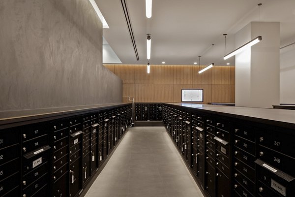 Mailroom at VOX Apartments featuring secure parcel lockers