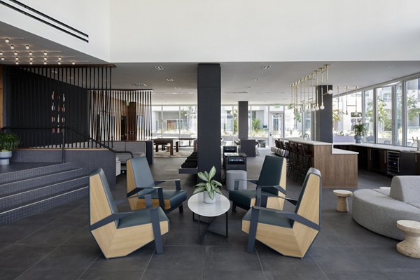 Clubhouse featuring modern design and social spaces at VOX Apartments