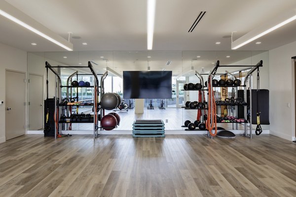 fitness center at VOX Apartments