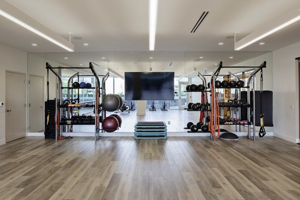 Fitness center with modern equipment at VOX Apartments, a Greystar luxury apartment community