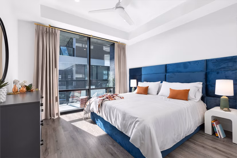 Modern bedroom with elegant decor at 1155 Barton Springs Apartments