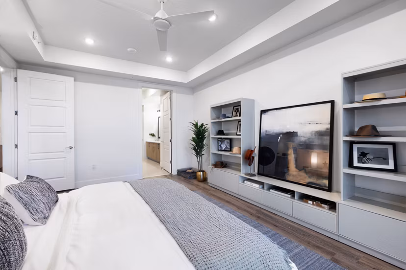 Cozy bedroom with modern decor at 1155 Barton Springs Apartments