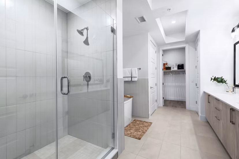 Bathroom with elegant finishes and modern fixtures at 1155 Barton Springs Apartments, Greystar luxury apartments in Austin