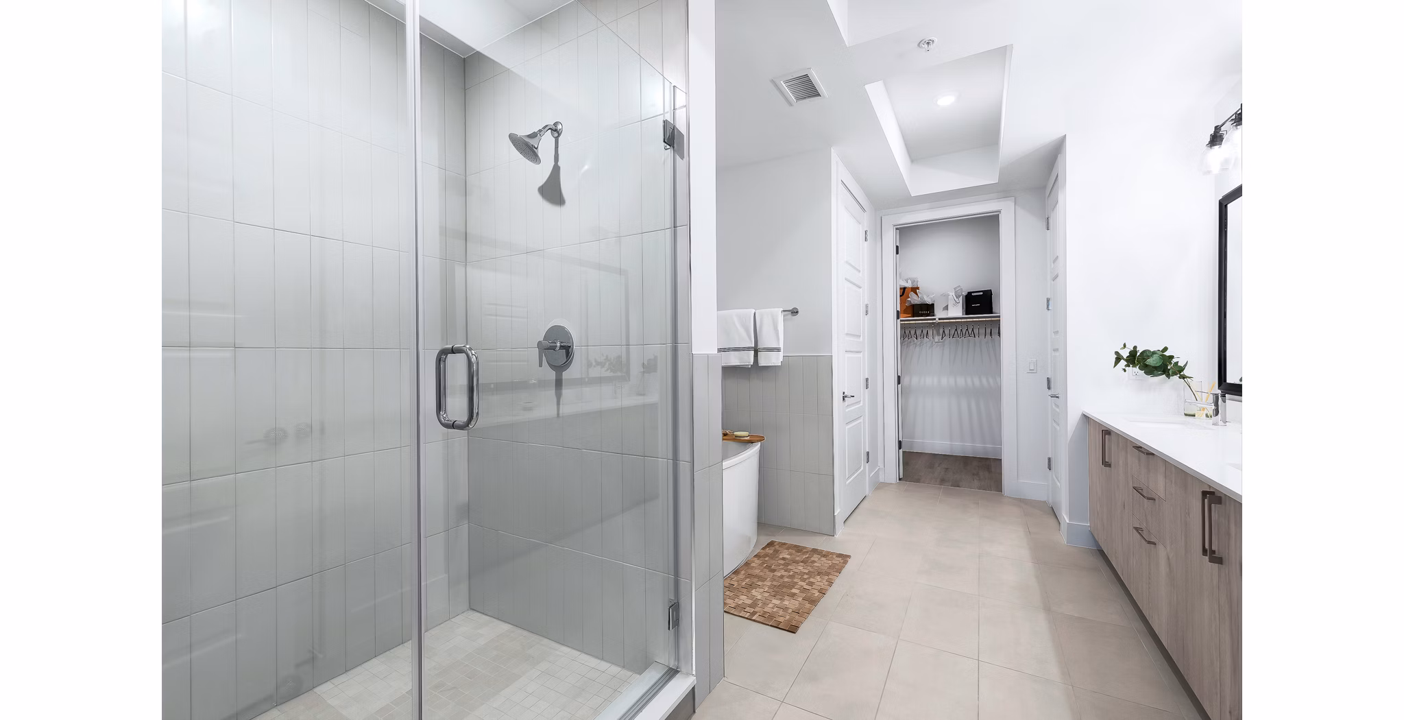 Bathroom with elegant finishes and modern fixtures at 1155 Barton Springs Apartments, Greystar luxury apartments in Austin