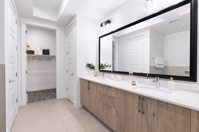 Elegant bathroom with marble sink and modern fixtures at 1155 Barton Springs Apartments