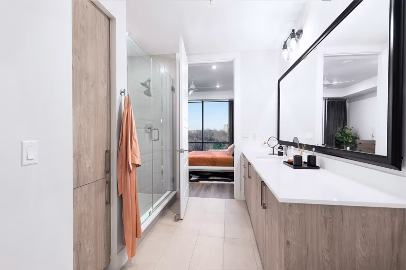 Modern bathroom with sleek fixtures at 1155 Barton Springs Apartments