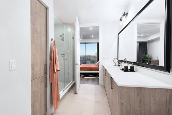 Modern bathroom with sleek fixtures at 1155 Barton Springs Apartments