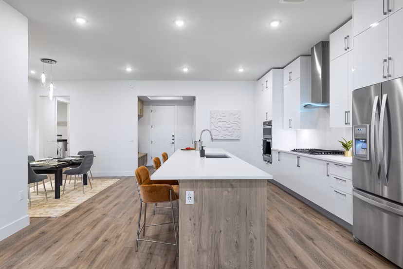 Modern kitchen with sleek cabinetry and stainless steel appliances at 1155 Barton Springs Apartments