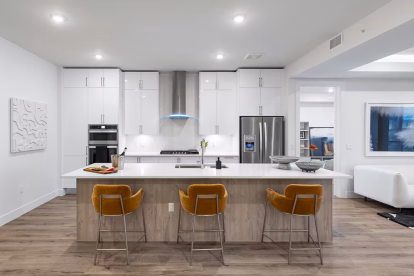 Modern kitchen with stainless steel appliances at 1155 Barton Springs luxury apartments in Austin