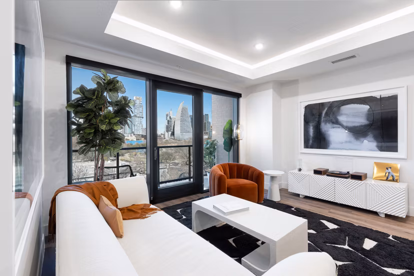 Spacious living room with modern decor at 1155 Barton Springs Apartments
