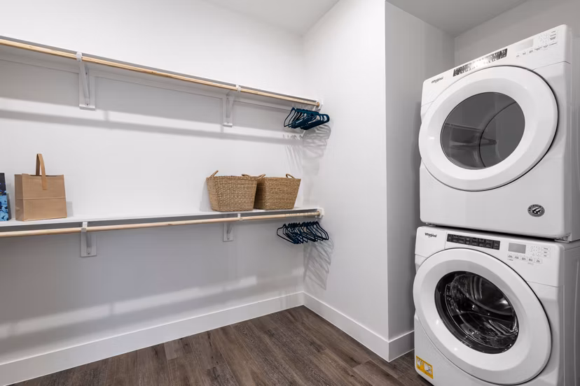 Laundry room with modern appliances at 1155 Barton Springs Apartments in Austin