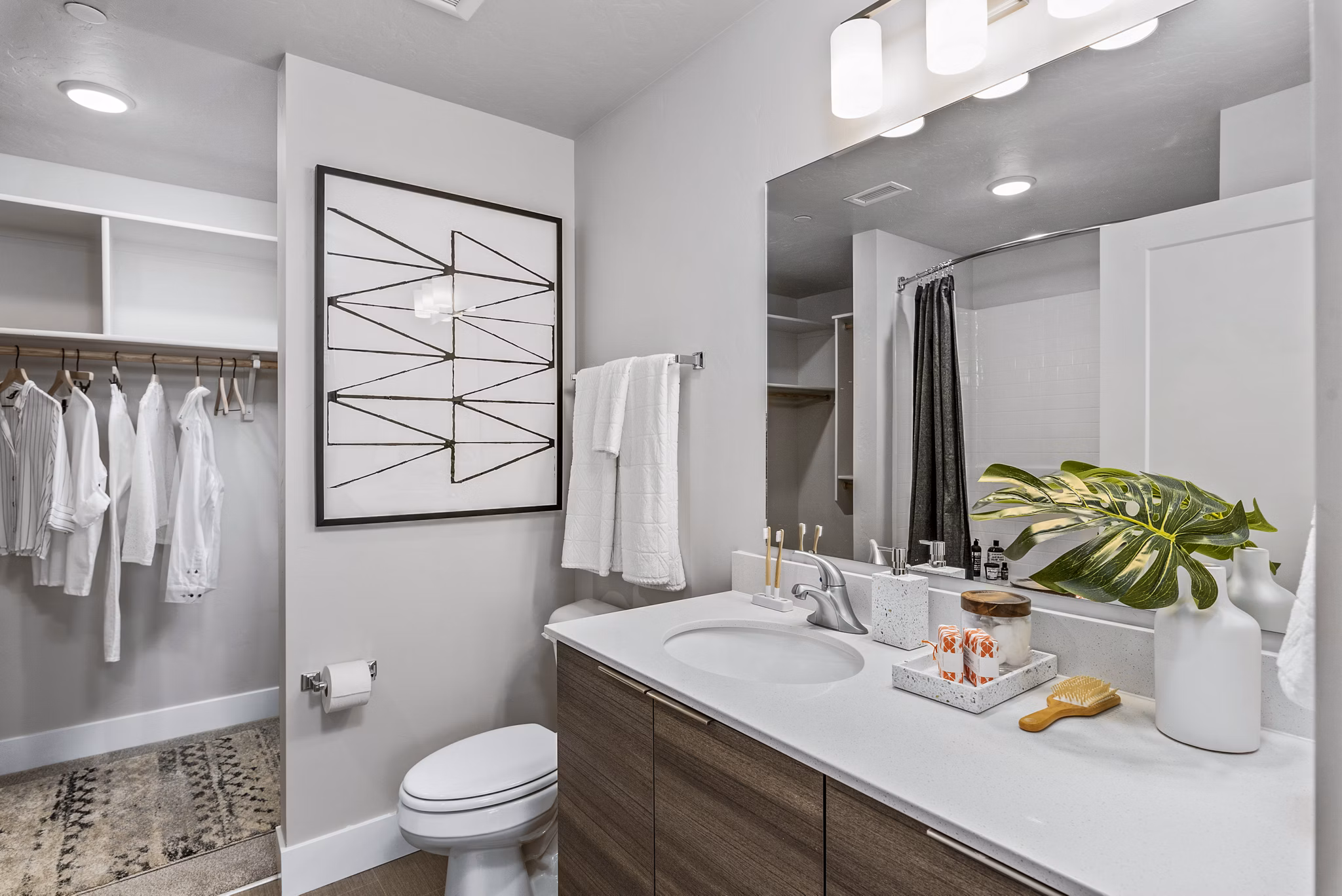 Modern bathroom with elegant fixtures at The Lofts at Ten Mile Apartments