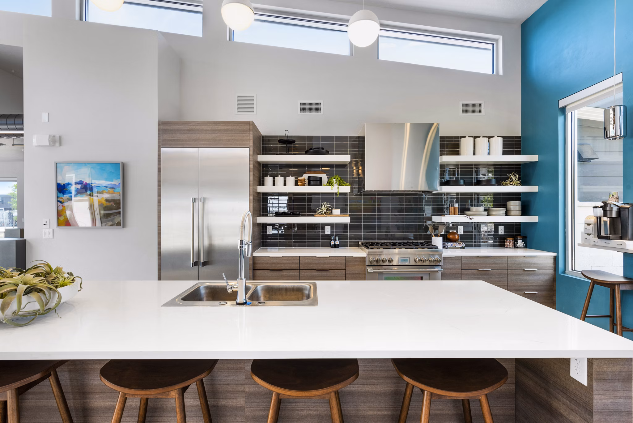 Clubhouse with modern furnishings and social spaces at The Lofts at Ten Mile Apartments in a vibrant community setting
