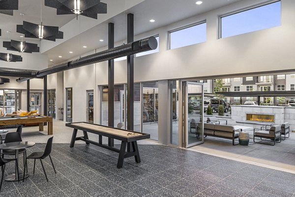 The Lofts at Ten Mile: Outdoor patio with fire pit for cozy evenings at luxury apartments
