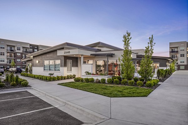 Clubhouse and leasing office at The Lofts at Ten Mile Apartments featuring contemporary design and comfortable seating areas
