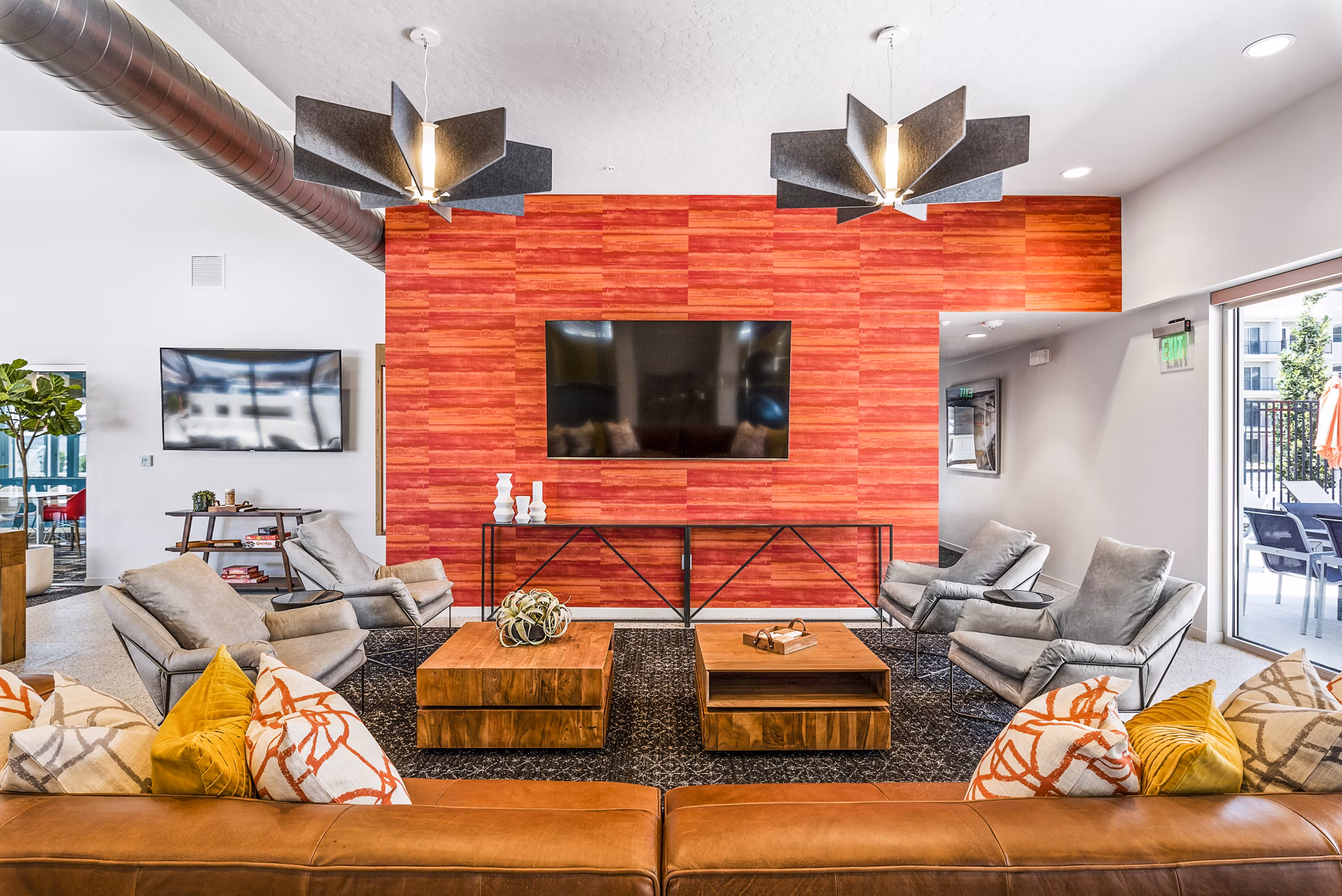 Stylish clubhouse featuring modern decor at The Lofts at Ten Mile Apartments