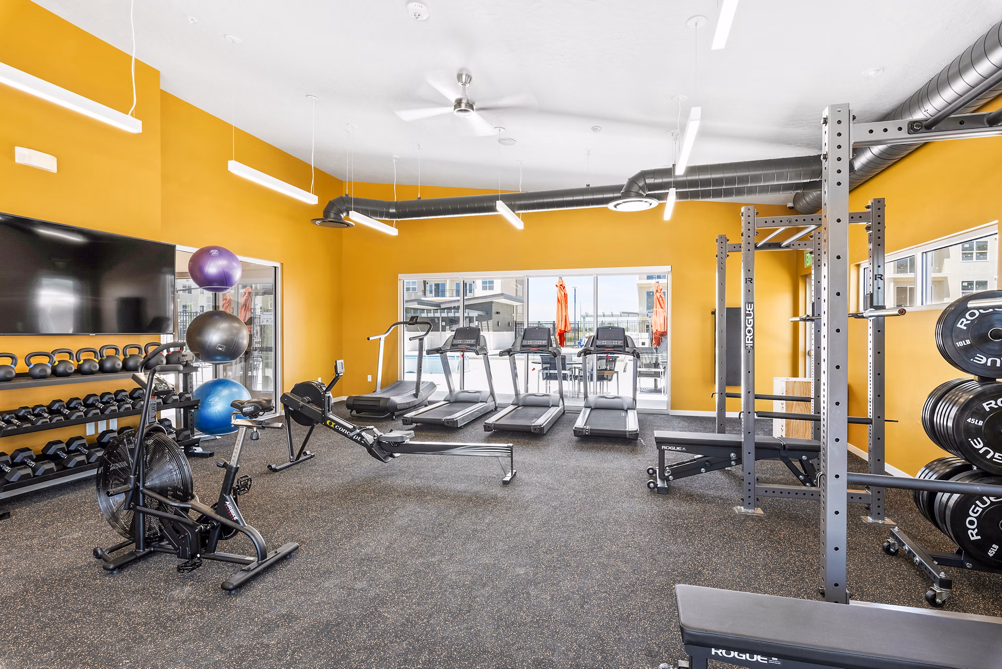 Modern fitness center with state-of-the-art equipment at The Lofts at Ten Mile Apartments