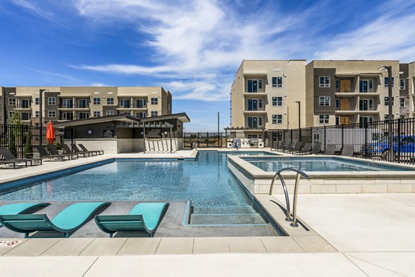 Infinity-edge pool at The Lofts at Ten Mile Apartments offering luxurious leisure experience