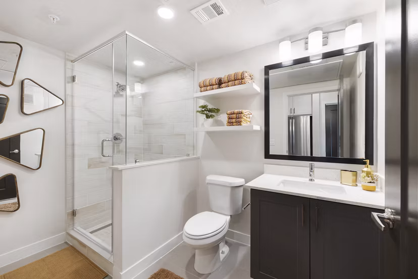 Bathroom with modern fixtures and sleek design at Art House Sawyer Yards Apartments in Houston