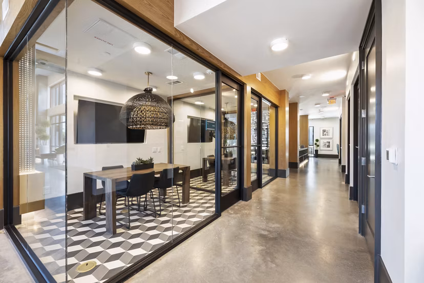 Modern meeting facility at Art House Sawyer Yards Apartments with sleek design and abundant natural light