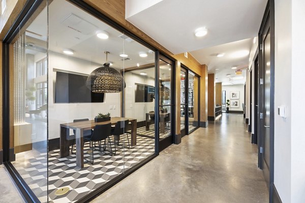 Modern meeting facility at Art House Sawyer Yards Apartments with sleek design and abundant natural light