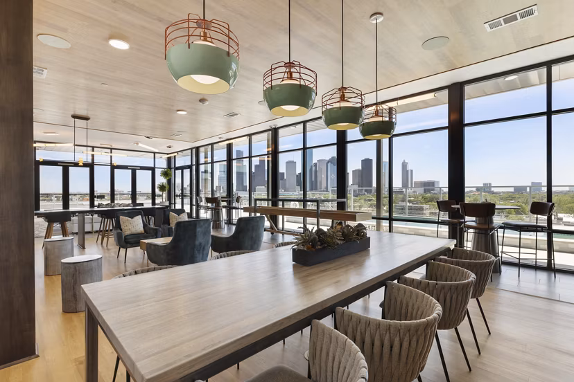 Clubhouse with modern design at Art House Sawyer Yards Apartments featuring open spaces and stylish seating