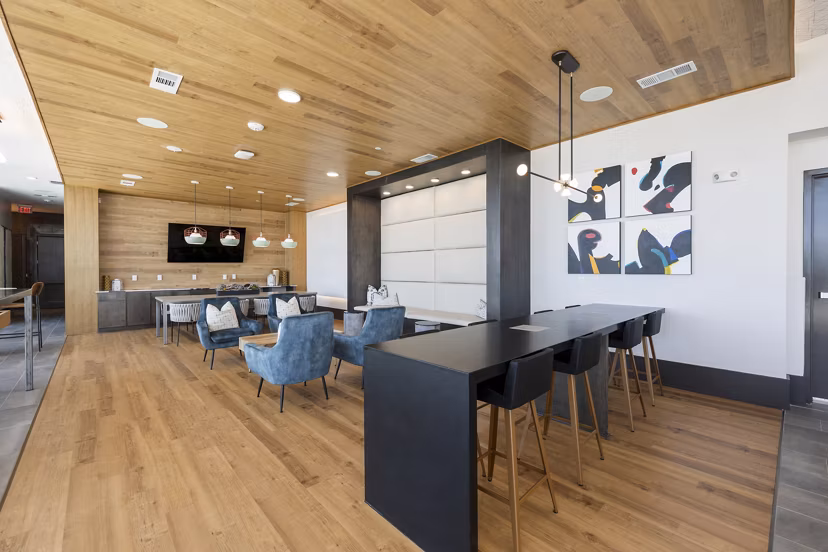 Clubhouse featuring modern design elements at Art House Sawyer Yards Apartments in a luxury community