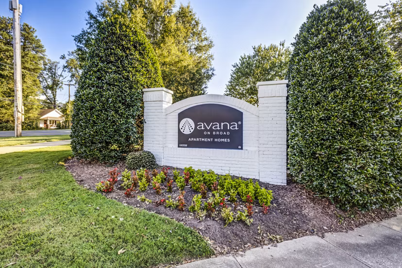 Avana on Broad Apartments signage showcasing luxury living in a serene environment