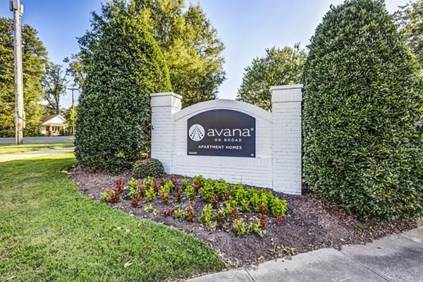Avana on Broad Apartments signage showcasing luxury living in a serene environment