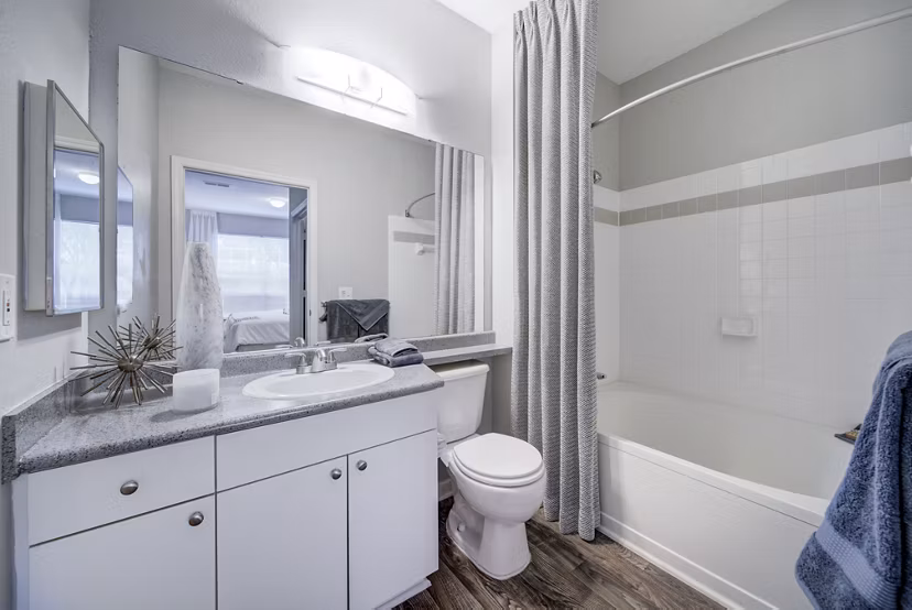 Modern bathroom with sleek fixtures at Avana on Broad Apartments, a luxury living community
